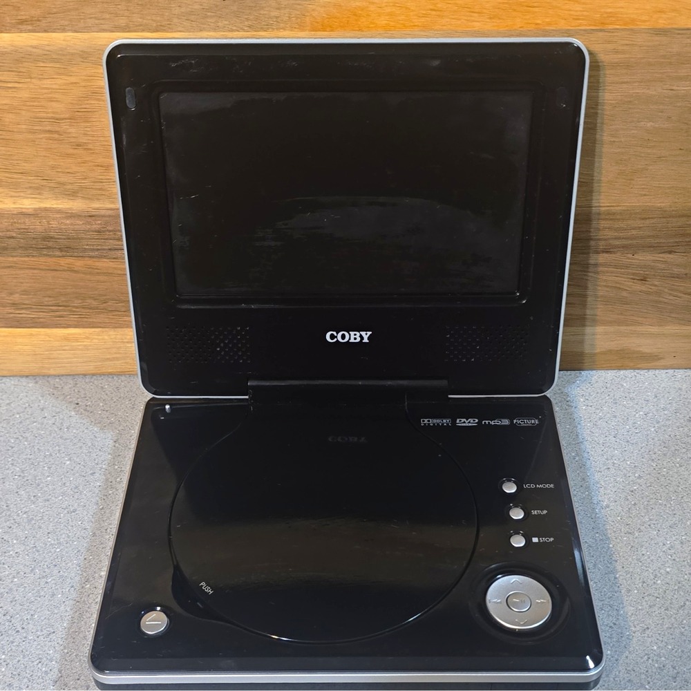 COBY TF-DVD7006 Portable DVD/CD/MP3 Player Dolby Digital Picture Display